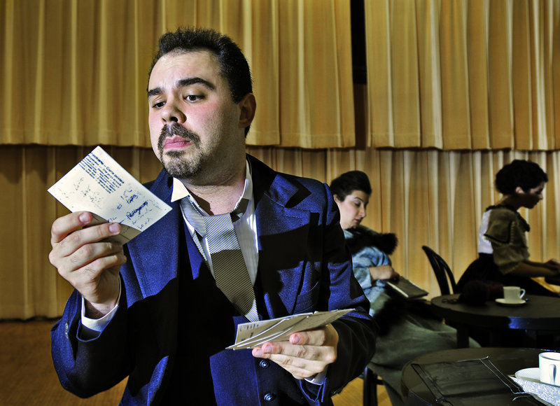 Robert Mellon of Long Island rehearses a scene for the PORTopera show “Cafe Vienna” at Corthell Concert Hall at the University of Southern Maine School of Music in Gorham.