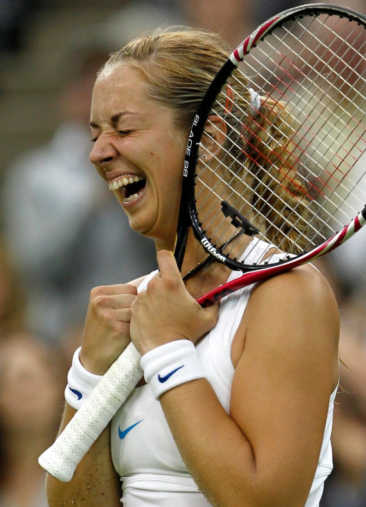 Sabine Lisicki reacts after the final point in her 3-6, 6-4, 8-6 victory over third-seeded Li Na in the second round at Wimbledon on Thursday. Lisicki had 17 aces during the match, including one that registered 124 mph.