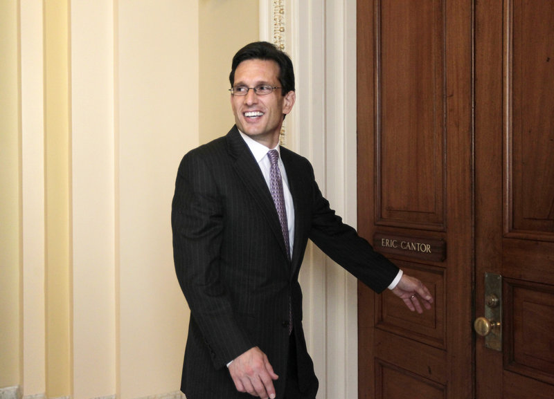Debt-reduction talks led by Vice President Joe Biden were “in abeyance” Thursday after House Majority Leader Eric Cantor, shown at his office, said he would not attend a negotiating session.