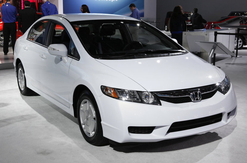 A 2011 Honda Civic Hybrid is displayed at an auto show in Detroit. The Civic earned the highest initial quality ranking for compact cars in a J.D. Power and Associates study.