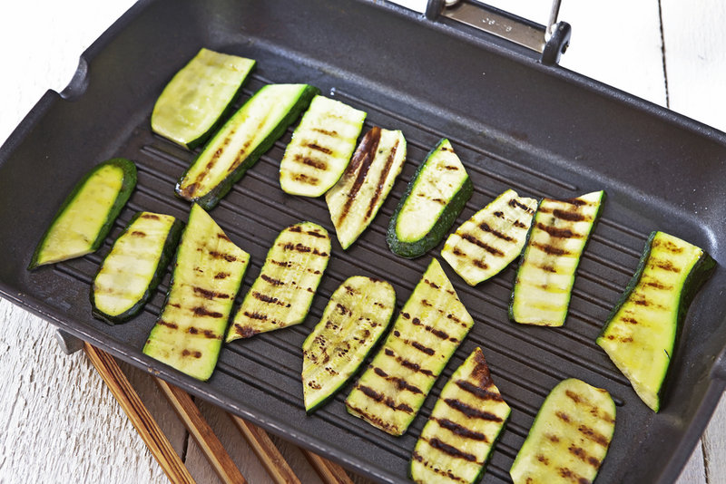 Moisture-heavy vegetables like zucchini can stick to a grill that isn’t hot enough, but a too-hot fire can quickly turn your veggies into charcoal if you’re not careful.