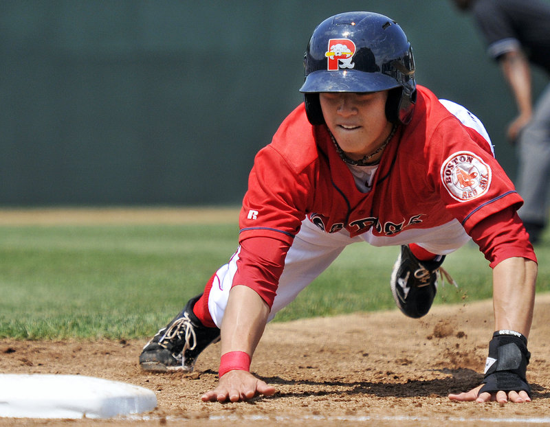 Jon Hee of the Sea Dogs heads back to first base during the game against the New Britain Rock Cats. The Sea Dogs meet New Hampshire tonight.