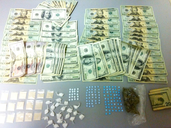 Drugs and money confiscated in South Portland bust.
