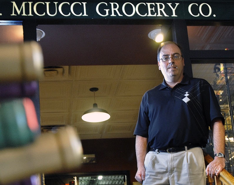 Rick Micucci, owner of Micucci Grocery on India Street in Portland, remembers times when his father would buy an entire rail car full of canned tomatoes.