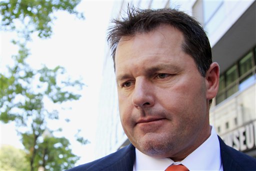 Former Major League baseball pitcher Roger Clemens leaves federal court in Washington, Thursday, July 14, 2011, after the judge declared a mistrial in his perjury trial after prosecutors showed jurors evidence that the judge had ruled out of bounds. (AP Photo/Manuel Balce Ceneta)