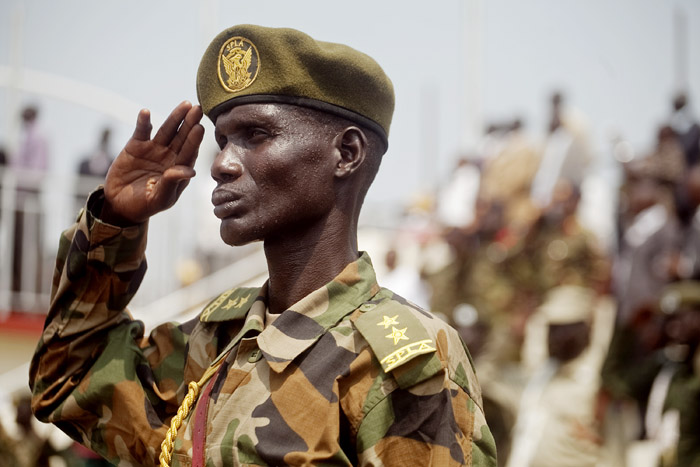 A Southern Sudanese soldier stands at attention for the national anthem during an independence rehearsal in Juba, southern Sudan on Thursday.