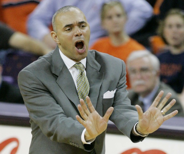 Virginia's head coach Dave Leitao gestures as he talks to his players during the second half of their basketball game against Clemson, Sunday, Jan. 28, 2007, at Littlejohn Coliseum in Clemson, S.C. Virginia defeated Clemson, 64-63. (AP Photo/Mary Ann Chastain)