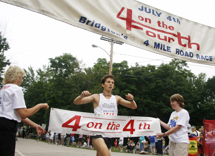 Jonny Wilson, 23, of Falmouth is the winner of the 4 on the Fourth road race today.