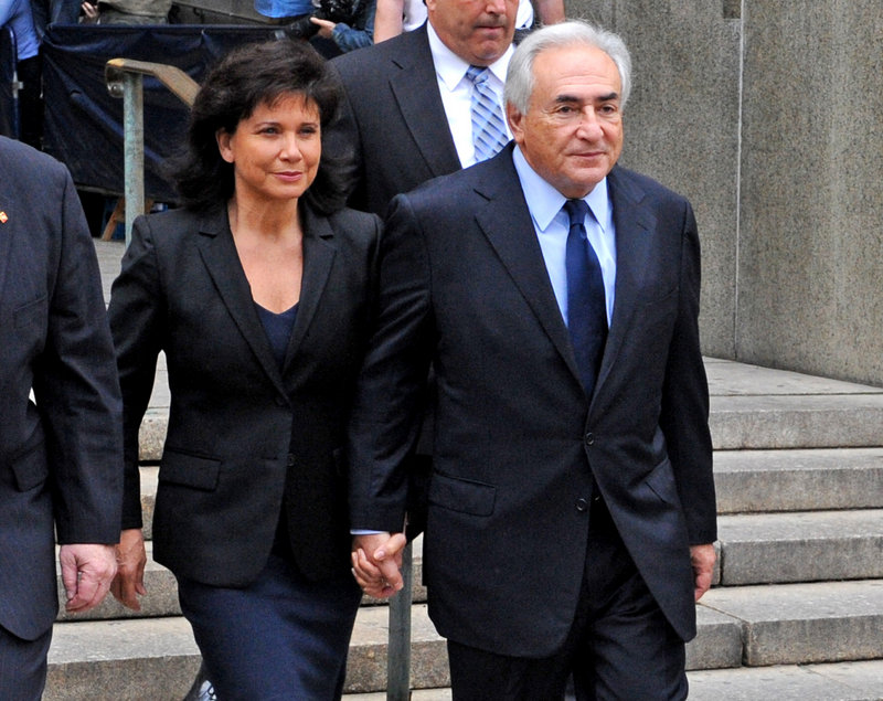 Former International Monetary Fund leader Dominique Strauss-Kahn leaves Manhattan Criminal Court in New York after his arraignment on June 6.