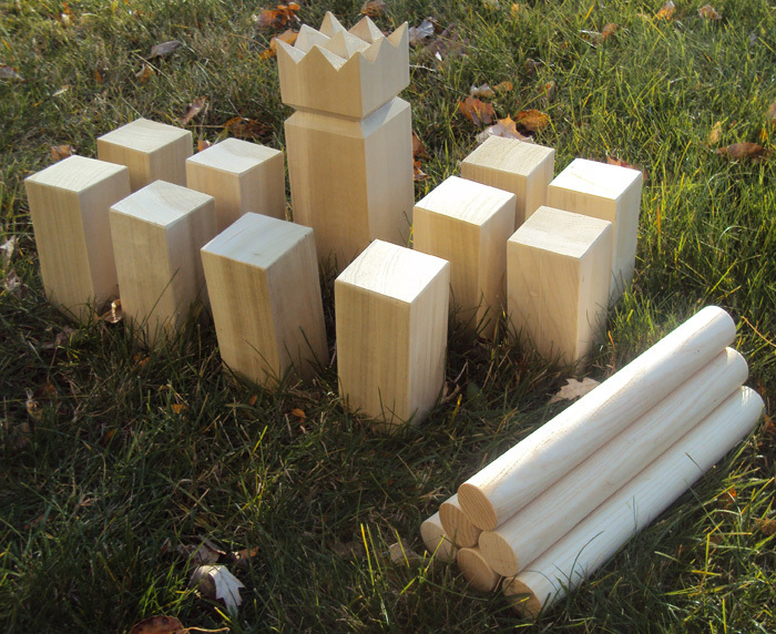 A kubb set includes the king, wooden blocks and throwing sticks. The game, a favorite in Sweden, is gaining fans on this side of the Atlantic. It involves throwing a stick to knock over an opponent’s blocks and then the king.