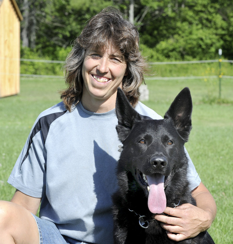 Doreen Metcalf breeds and trains dogs such as Levi, a 3-year-old German shepherd.