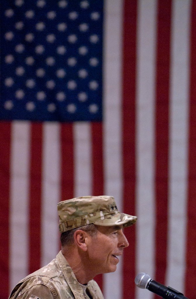 U.S. and NATO commander Gen. David Petraeus speaks Monday before administering the oath of re-enlistment to 235 U.S. service members at Kandahar Air Field in Afghanistan.