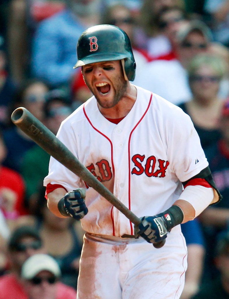 Dustin Pedroia reacts after striking out in the ninth inning Monday against the Blue Jays. Boston spotted Toronto a 7-0 lead before climbing back into the game.