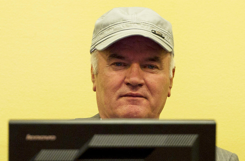 Former Bosnian Serb military chief Ratko Mladic wears a cap despite court orders not to at the U.N.’s Yugoslav war crimes tribunal in The Hague, Netherlands, on Monday.