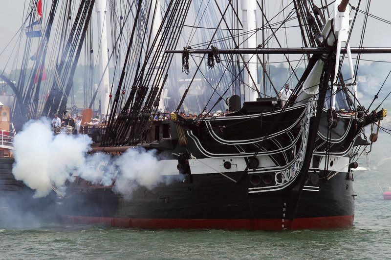 The USS Constitution fires its cannons off Castle Island in Boston on its annual Fourth of July trip in Boston Harbor on Monday. In Washington, the president and the first lady hosted a South Lawn barbecue for troops and their families.