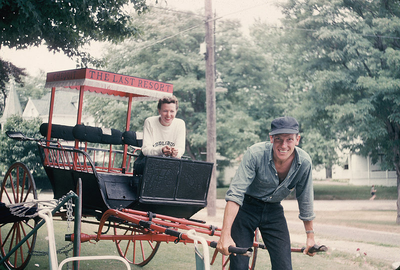 Norman Morse horses around with a cart carrying a friend while visiting Shelter Island, on Long Island, N.Y., in 1950.