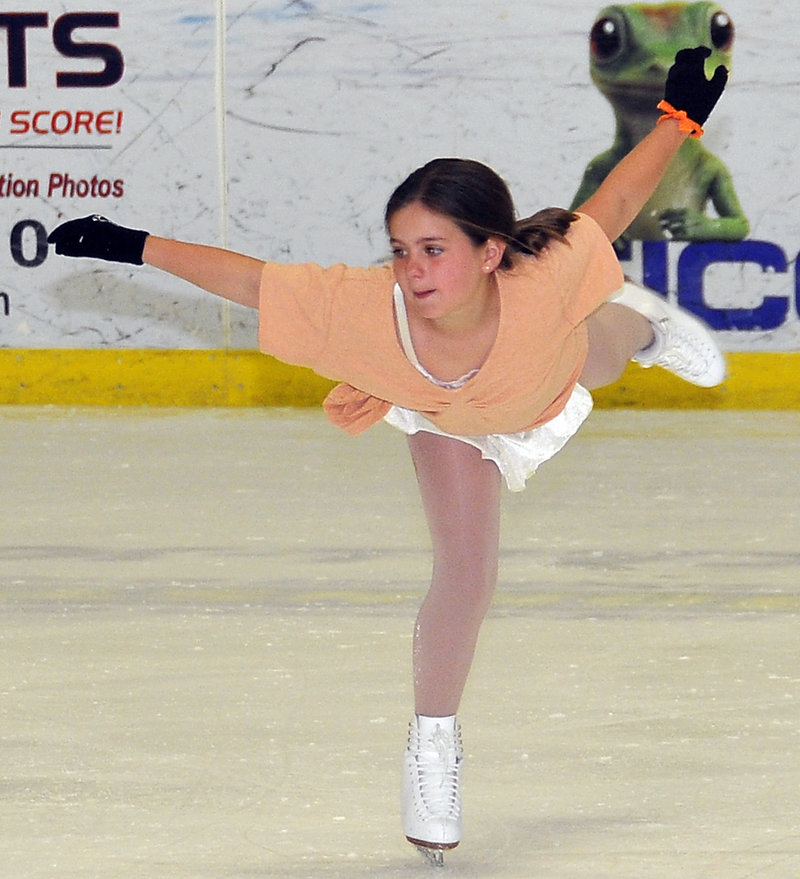 Ella Ferguson, 8, Portland, works on her moves at an open session last week at the Portland Ice Arena.