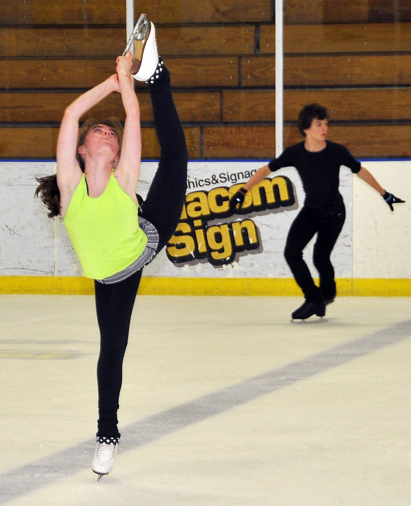 Julia Gilman, 14, of Falmouth works on her form at the Portland Ice Arena.