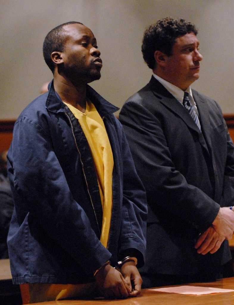 Daudoit Butsitsi stands next to his attorney, Anthony Sineni, at a hearing in February 2010.