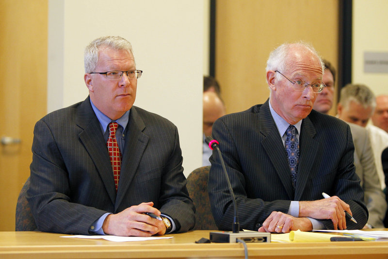 Paul Violette, former executive director of the Maine Turnpike Authority, left, with attorney Peter DeTroy, appears before the Legislature’s Government Oversight Committee on April 15 in Augusta. Violette invoked his constitutional right against self-incrimination and refused to answer questions about the authority’s spending practices.