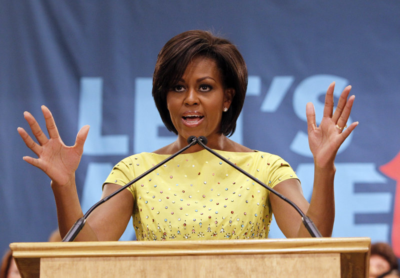 First Lady Michelle Obama, shown speaking at a school in Louisiana last fall when she began a campaign against childhood obesity, said Wednesday she was encouraged by news that new stores would be opening in “food deserts.”