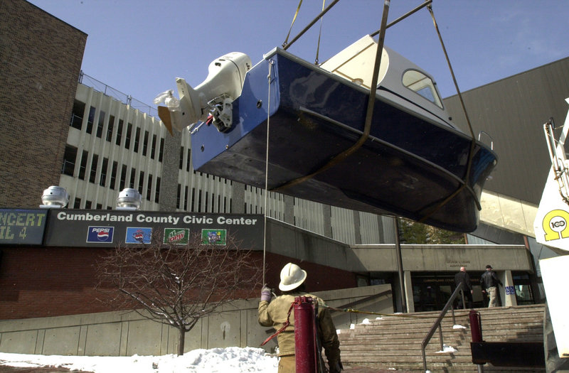 A boat is unloaded for a commercial show at the Cumberland County Civic Center. A reader thinks the facility should either be private or belong to the city of Portland.