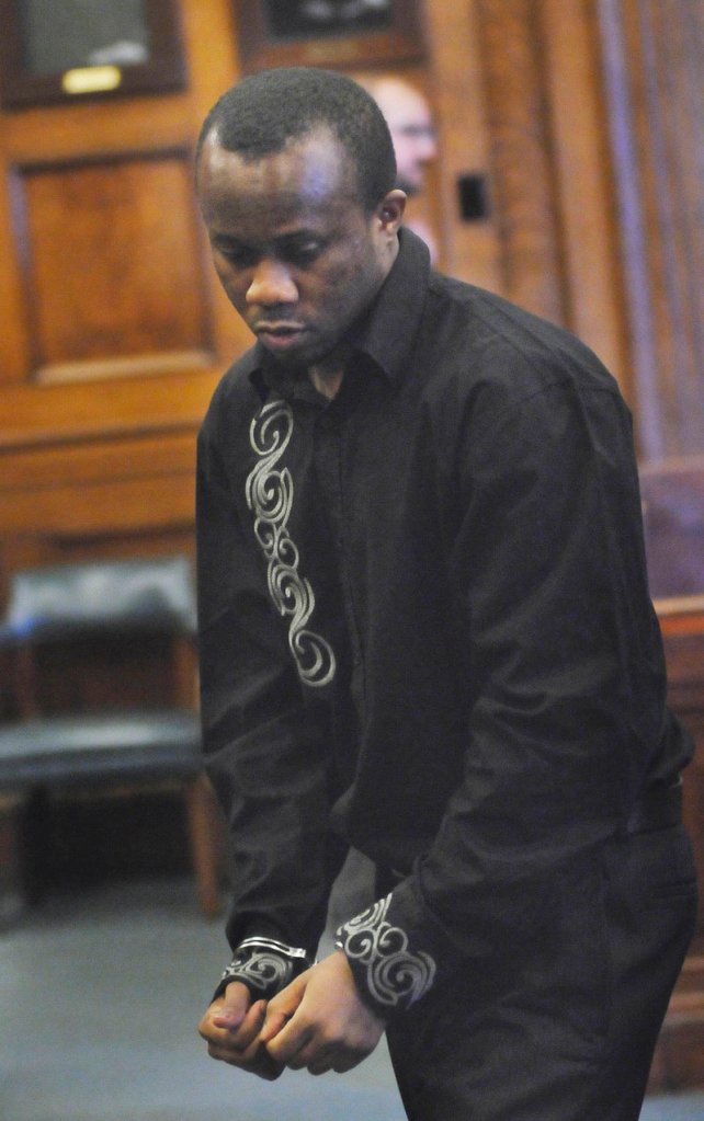 Daudoit Butsitsi leaves court in handcuffs Thursday after a jury found him guilty of murdering Serge Mulongo in the entryway of a Park Avenue apartment building on Feb. 10, 2010. He faces a sentence of 25 years to life in prison.