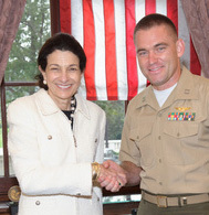 Sen. Olympia Snowe welcomes Marine Corps Capt. David J. Cote of Bangor to Washington in this undated photo. Cote has been named Military Times' 2011 Marine of the Year.