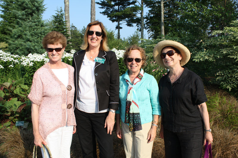 Board member Karen Bartholomew, who summers in Boothbay Harbor, Executive Director Maureen Heffernan, board member Martha Heald, who summers in Southport, and board member Ina Heafitz, who summers in Edgecomb, at the Tastefully Maine Party at Coastal Maine Botanical Gardens on Thursday.