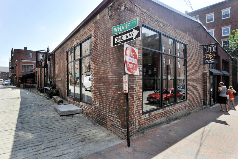 BACM 2007-3 Wharf Street LLC, whose attorney was running Friday’s auction, is the new owner of six properties in Portland’s Old Port with a bid of $5.9 million.