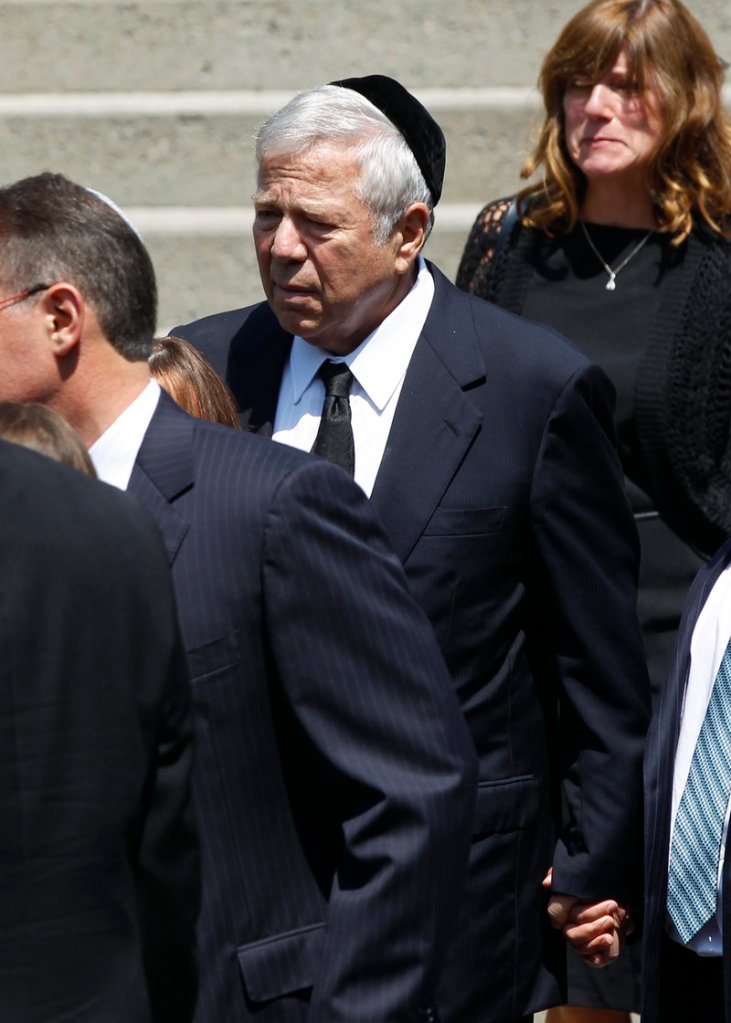 Robert Kraft, New England Patriots owner, stands among other mourners at Temple Emanuel in Newton, Mass.