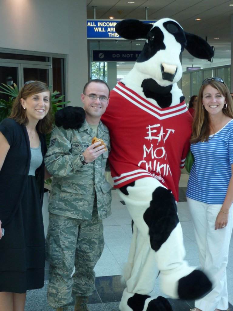 Ben Skelton of Concord, N.C., poses in 2010 with the Chick-fil-A cow mascot, who was to be the best man at Skelton’s wedding.