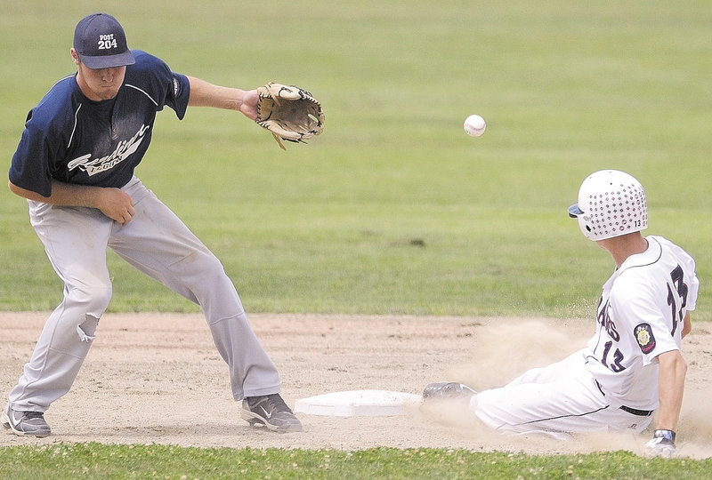 Christian Corneil of Bangor slides safely into second as the throw gets away from Gardiner shortstop Forrest Chadwick.