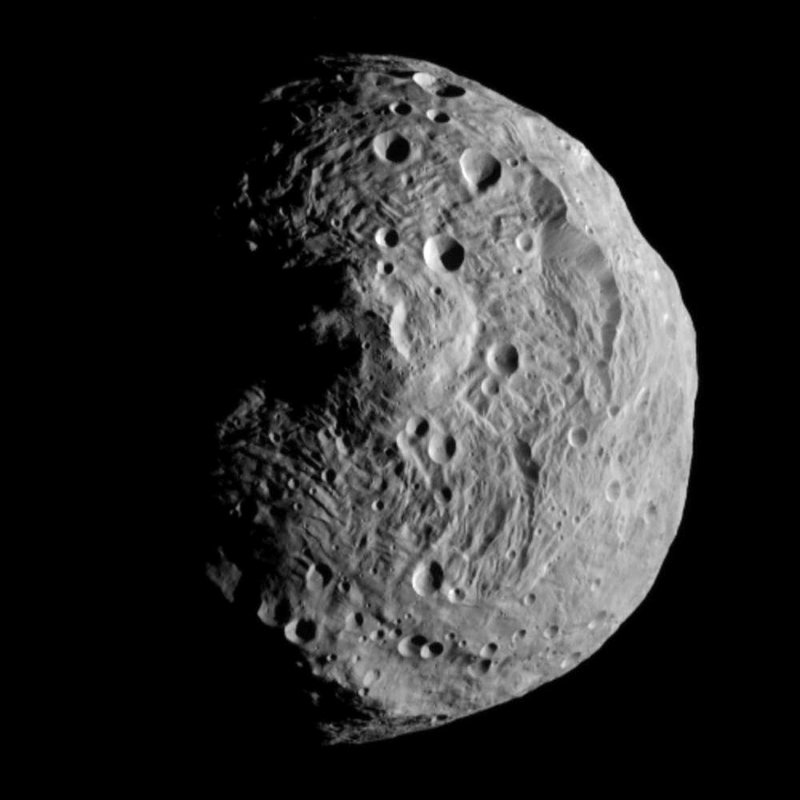 This file image released by the Jet Propulsion Laboratory shows the asteroid Vesta, photographed by the Dawn spacecraft on July 17. The image was taken from a distance of about 9,500 miles away.
