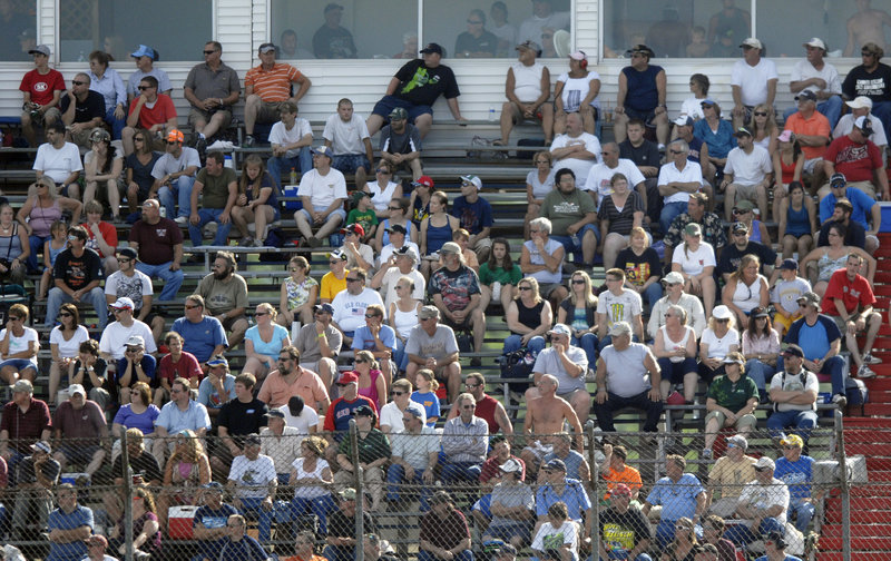 Fans take in the action at OPS on Sunday during qualifying for the TD Bank 250. More than 80 teams signed up to compete for 39 slots on the starting grid.