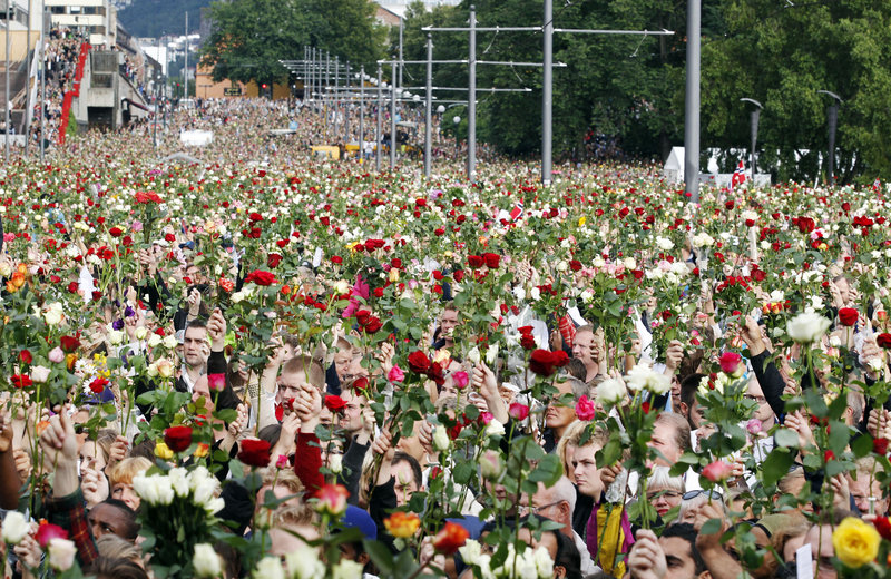 The Associated Press A rose march in Oslo on Monday drew 150,000 people – most holding flowers in memory of the 76 victims of Friday's bombing and shooting massacre.