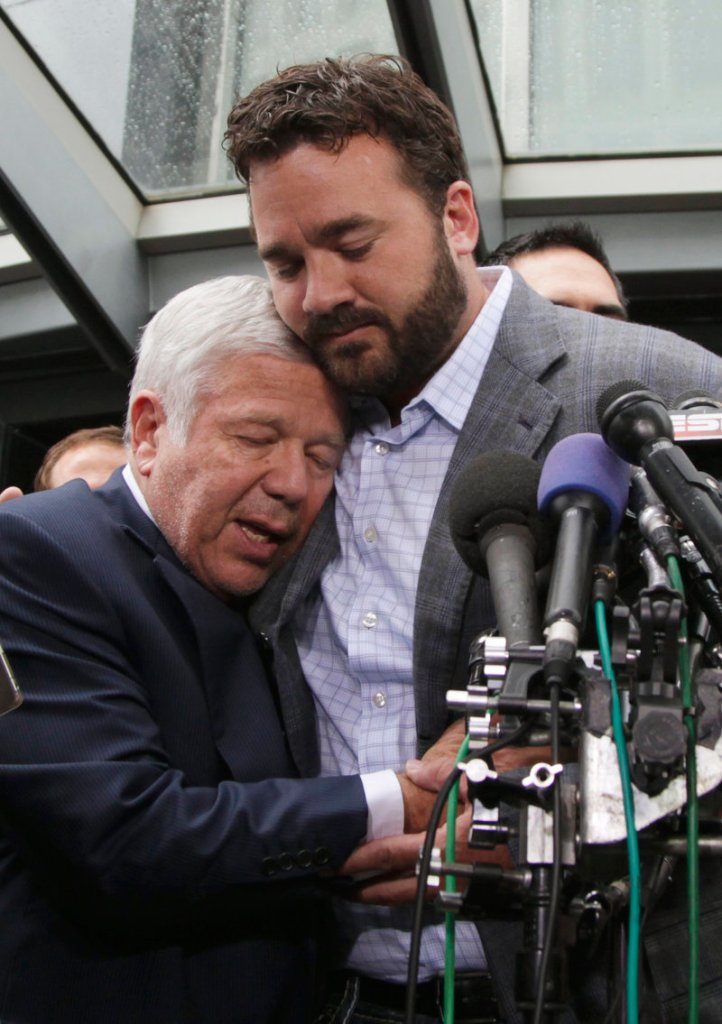 Patriots owner Robert Kraft and player rep Jeff Saturday embrace after a mention of Myra Kraft, who died July 20.