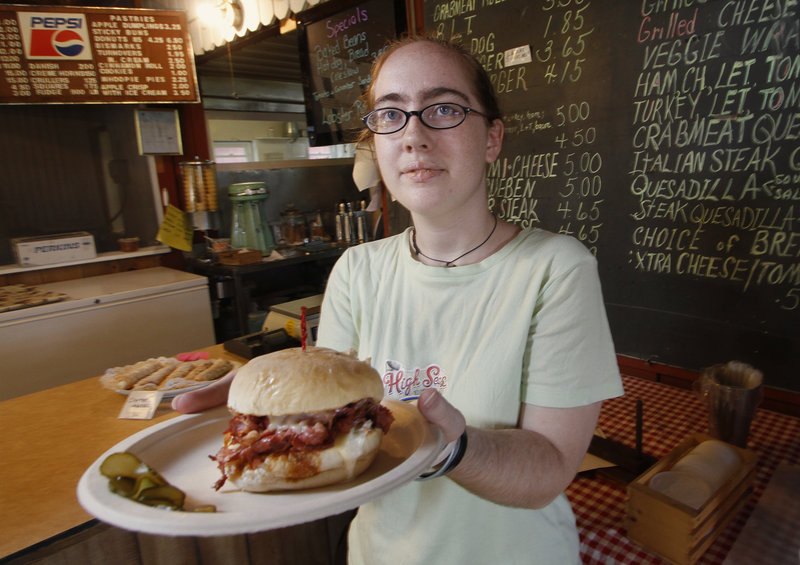 Alisha Springer serves up a Rocky Reuben sandwich.