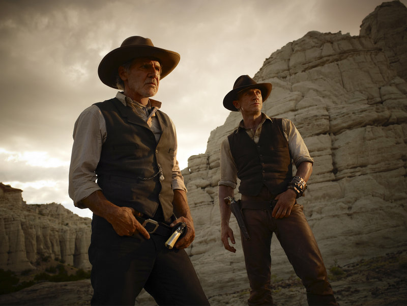 Harrison Ford, left, and Daniel Craig co-star in “Cowboys & Aliens.”