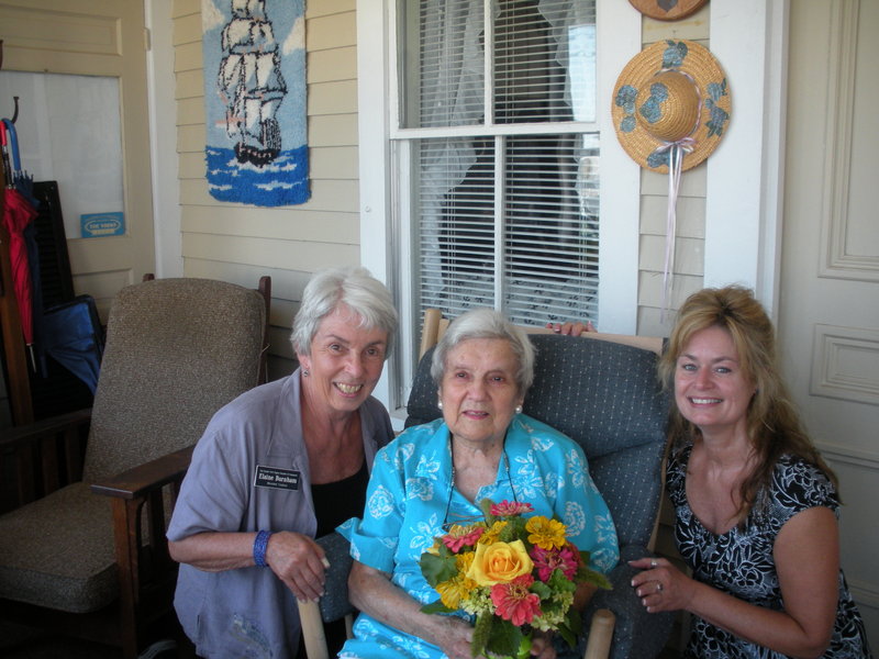 Irene Bennett, center, owner of Bennett’s Guest House in York, celebrated her 102nd birthday July 28 with friends including Liaison Elaine Burnham, left, of the Greater York Region Chamber of Commerce, and Business Manager Holly Roberts.