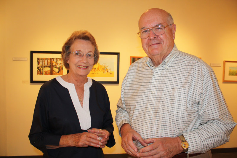 Doris McAfee and her husband, Robert McAfee, M.D., a University of New England trustee emeritus. They plan to bring their grandchildren to UNE s Art Gallery to see the Children s Book Illustrators show when they visit. We still have all the books at home, Robert McAfee said.