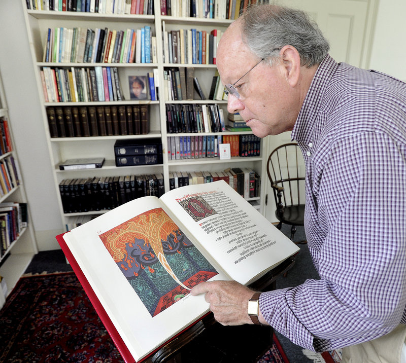 Paul Huss looks at the “Red Book” at the Maine C.G. Jung Center in Brunswick. “This ... is a place for kindred spirits who come from very diverse backgrounds,” he said.