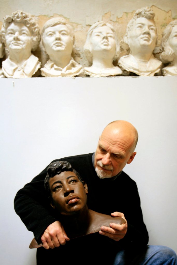 At his Philadelpha studio, Frank Bender holds a bust he created based on the remains found of homicide victim Rosella Atkinson.