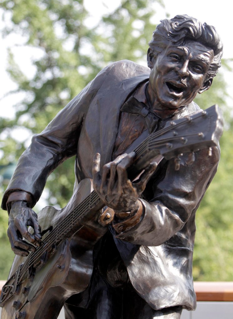 A bronze statue of legendary musician Chuck Berry is seen at the dedication attended by Berry on Friday in University City, Mo. The statue of the St. Louis native was dedicated near Blueberry Hill, the University City club where the octogenarian still performs monthly.