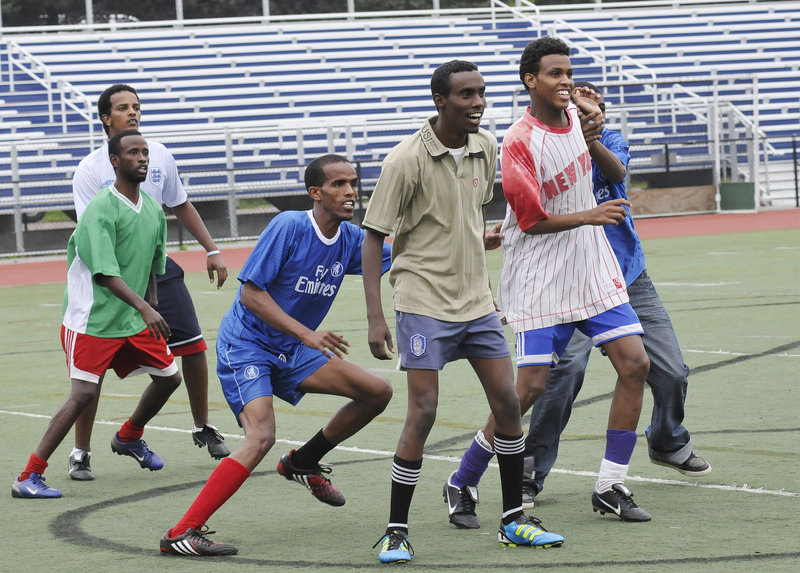 Players jockey for position prior to their games as the southern Maine Somali community plays soccer in support of Somalia on Friday.