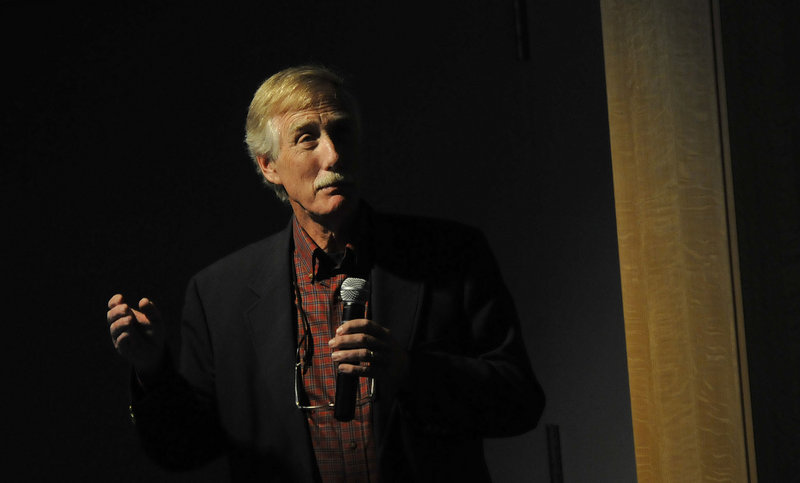 Former Gov. Angus King speaks at the Portland Public Library on Friday to promote "Governor's Travels," his recently published book.
