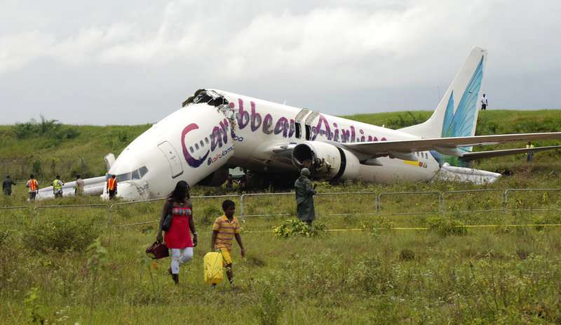 The broken fuselage of a Caribbean Airlines Boeing 737-800 is seen after it crashed at the end of the runway at Cheddi Jagan International Airport in Timehri, Guyana, on Saturday.