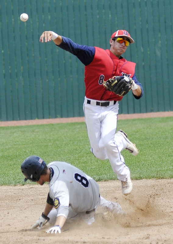Adam Pexton of Whitestown, N.Y., tries to turn a double play as Bedford’s Matthew Woodmansee slides into second during Monday’s championship game.