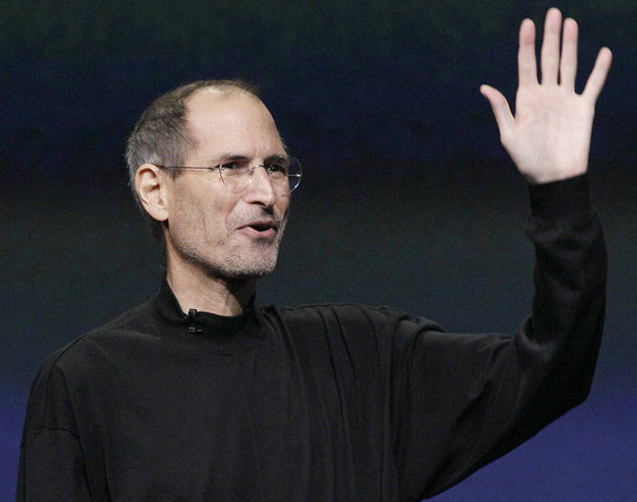 Steve Jobs waves to his audience at an Apple event in March in San Francisco.