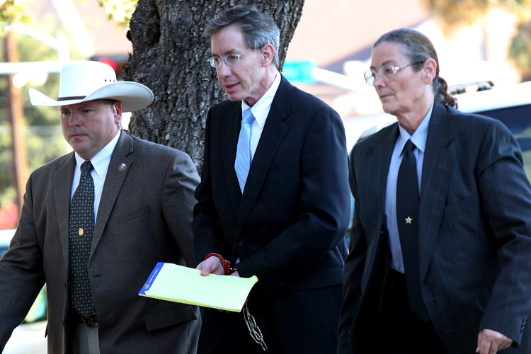 Warren Jeffs is taken into the Tom Green County Courthouse in San Angelo, Texas, on Monday. Jeffs was sentenced today to life in prison for sexually assaulting two girls, ages 12 and 15, whom he'd taken as brides. Jeffs has led the Fundamentalist Church of Jesus Christ of Latter Day Saints since 2002.